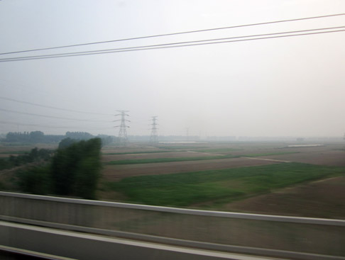 Beijing China Travel Blog: Countryside speeding by on the Shanghai Highspeed Bullet Train